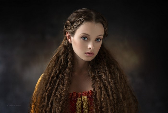 Portrait of Woman with Long Brown Hair and Braids