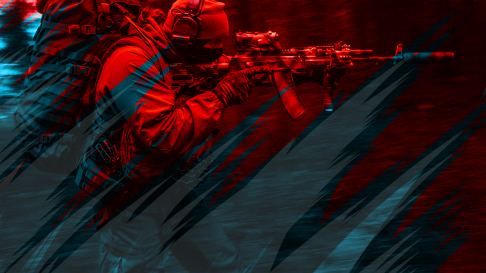 Soldier in red uniform aiming assault rifle