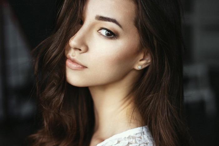 Portrait of a Woman with Long Wavy Hair