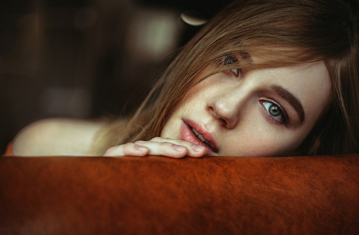 Portrait of a young woman with brown hair by Marietta Yushkova