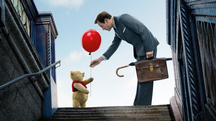 Winnie-the-Pooh and Christopher Robin with a balloon