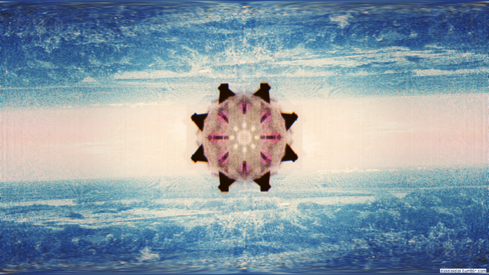 Abstract sunlit ocean with a central mandala