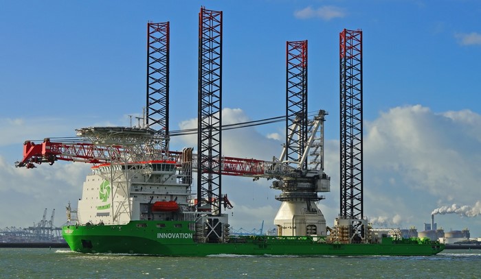 Jackup rig crane vessel Innovation sailing in port