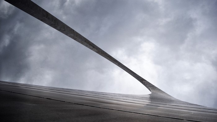 Gateway Arch against cloudy sky