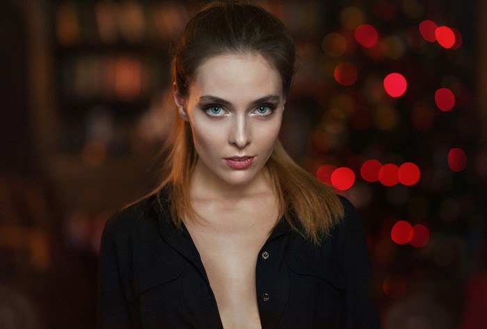 Portrait of a Woman with Brown Hair in Dim Light