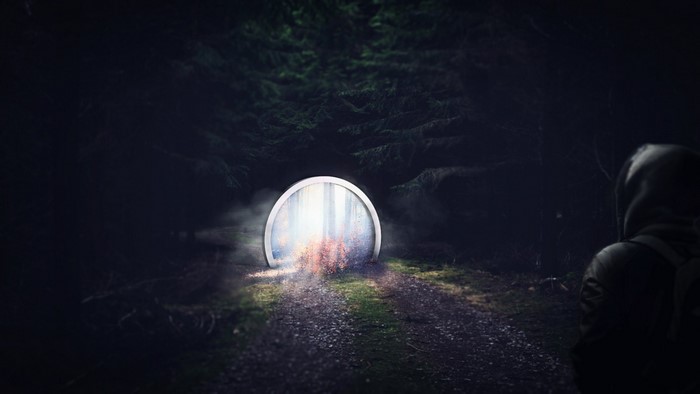 Mysterious portal in a dark forest at night