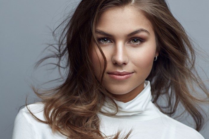 Portrait of a young woman with brown hair
