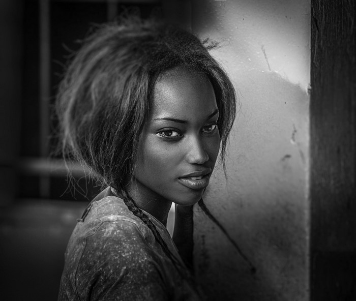 Portrait of a young Black woman with braided hair