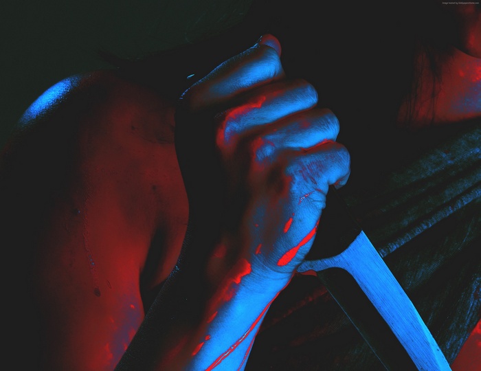 BuyBust poster with hand holding knife