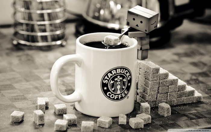 Starbucks coffee cup with Danbo and sugar cubes