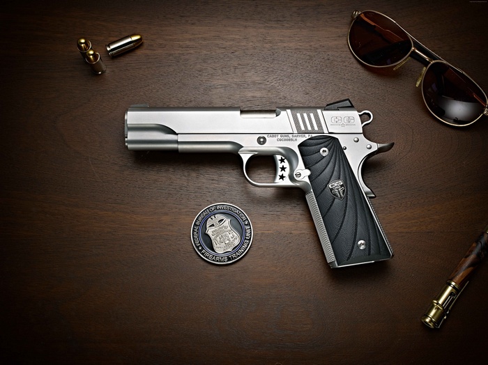 Cabot 1911 pistol with FBI coin and sunglasses