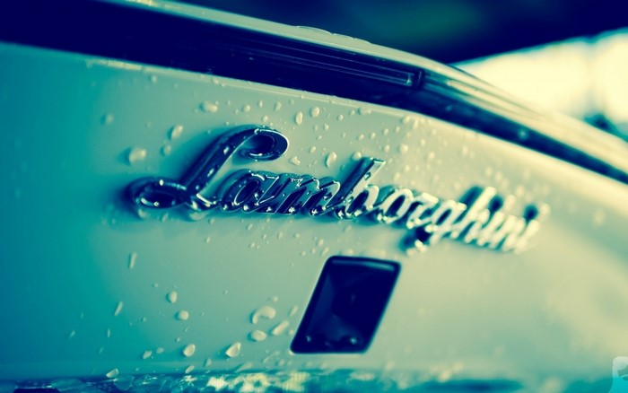 Lamborghini car emblem with water droplets