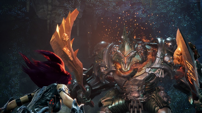 Fury from Darksiders III fighting a large armored creature