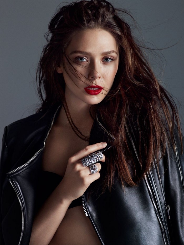 Elizabeth Olsen wearing a black leather jacket and jewelry