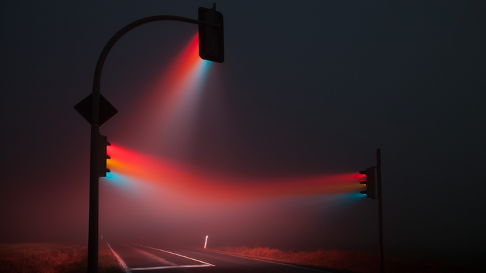Traffic lights in fog at night