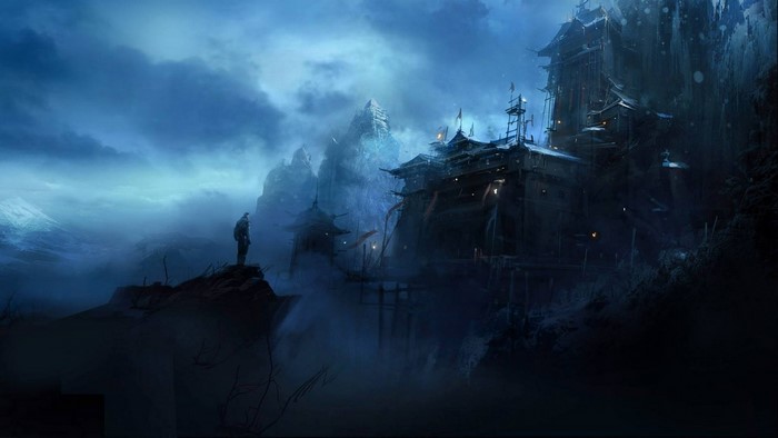A lone figure stands on a cliff overlooking a misty mountain village