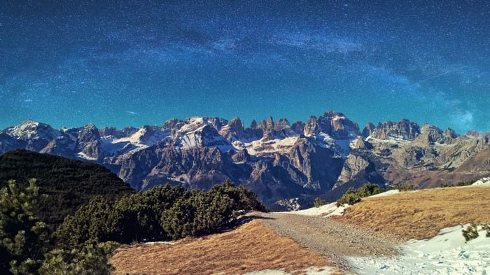 Mountain range under a starry sky