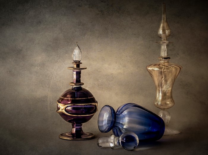 Still life of antique glass perfume bottles