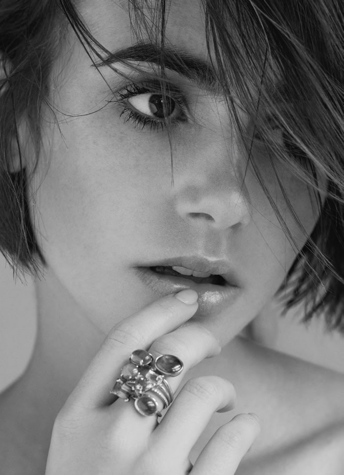 Lily Collins portrait with hand on lips