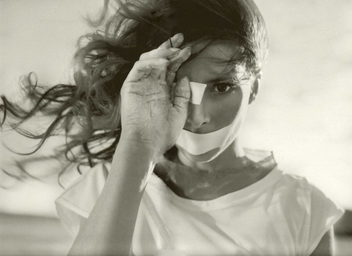 Mylène Farmer portrait with tape on mouth