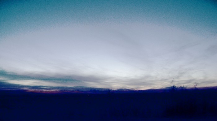 Blurred Horizon at Dusk with Faint Lights
