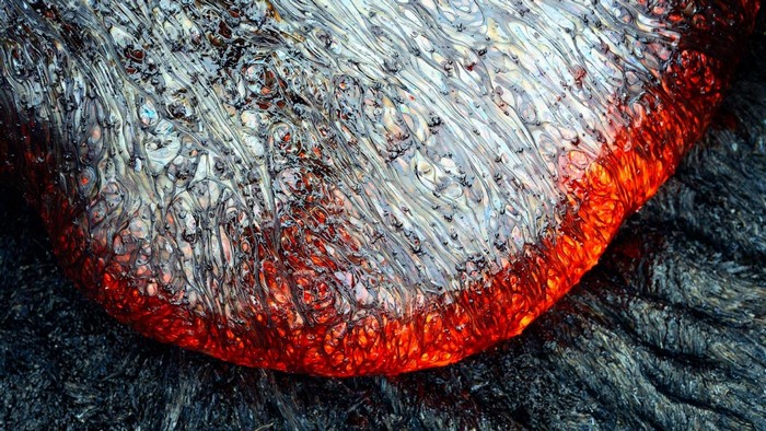 Close-up of flowing lava with intricate textures