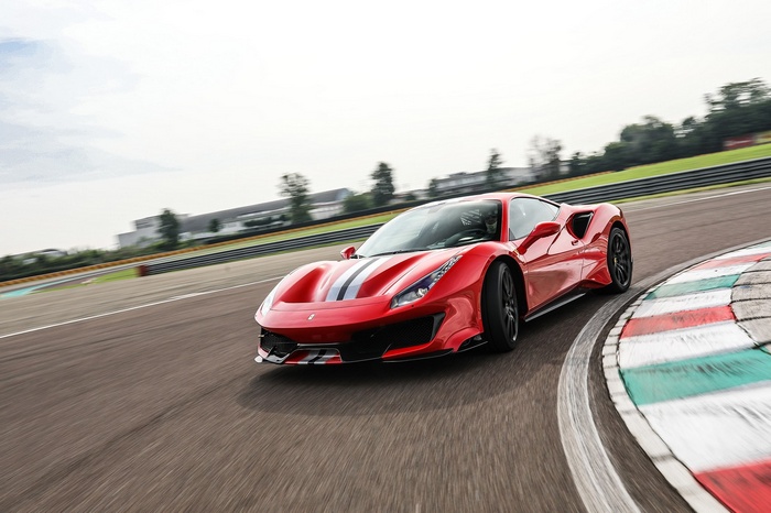 Red Ferrari 488 Pista on a Race Track