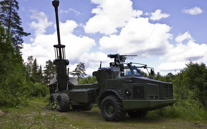 Archer Artillery System military vehicle in a forest