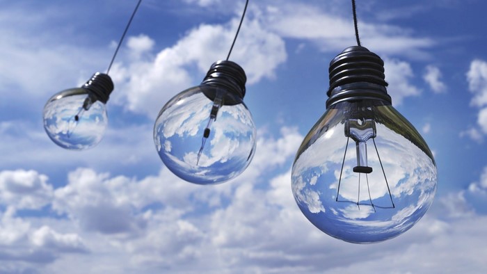 Light bulbs reflecting the sky