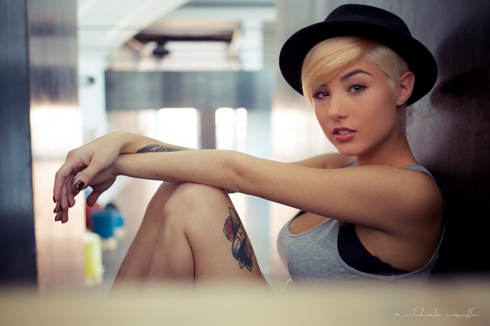 Portrait of a Blonde Model with Short Hair and Tattoos