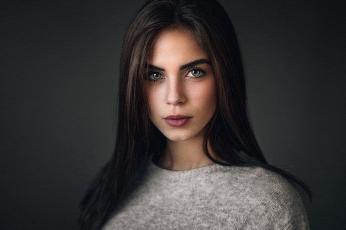 Portrait of a Woman with Green Eyes and Straight Brunette Hair