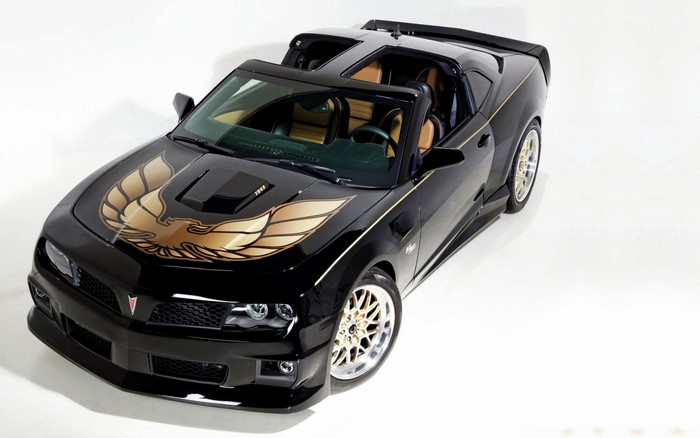 Black Pontiac Firebird Trans Am with gold bird decal