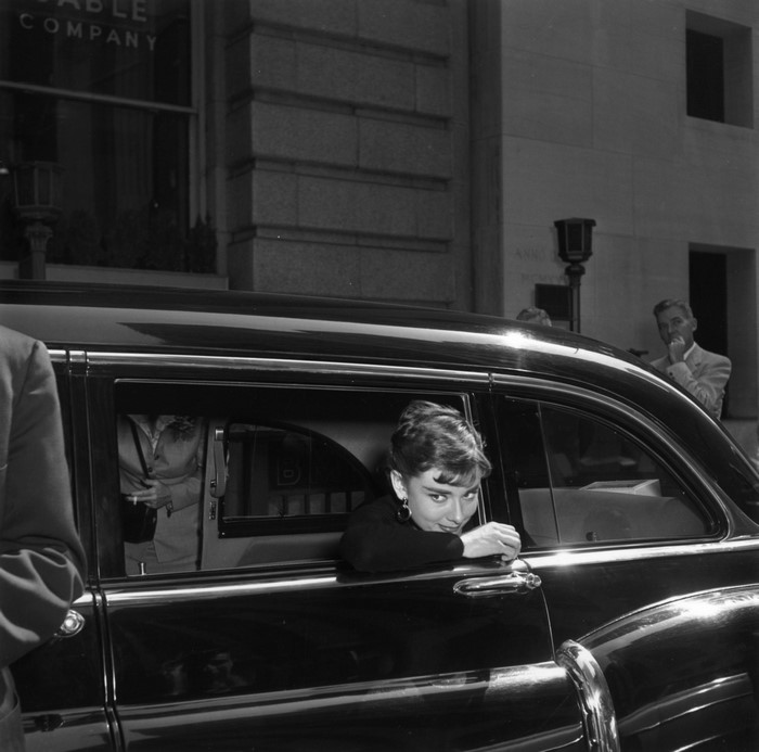 Audrey Hepburn in a vintage car