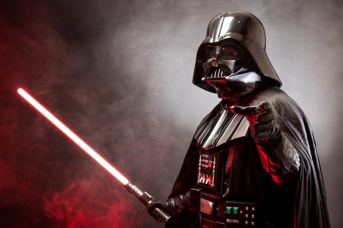 Darth Vader with Red Lightsaber in Dark Atmosphere