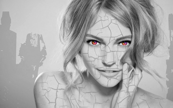 Woman with cracked skin and colorful eyes