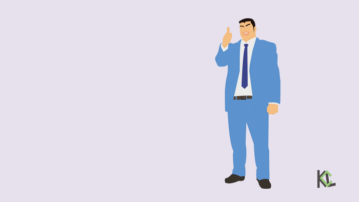 Man in a blue suit giving a thumbs up