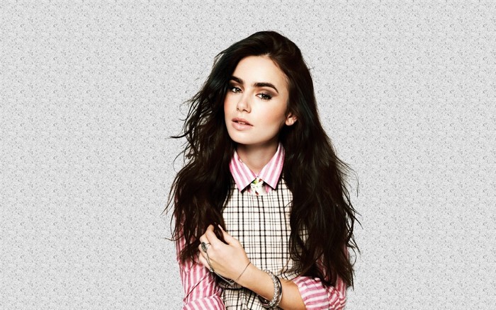 Lily Collins posing for a photoshoot