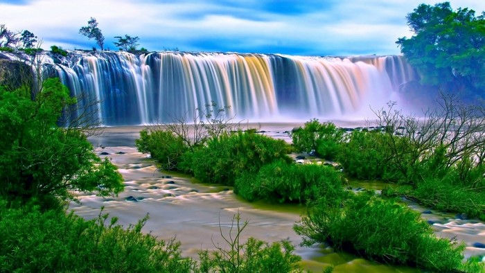 Waterfall in Vietnam with lush green foliage