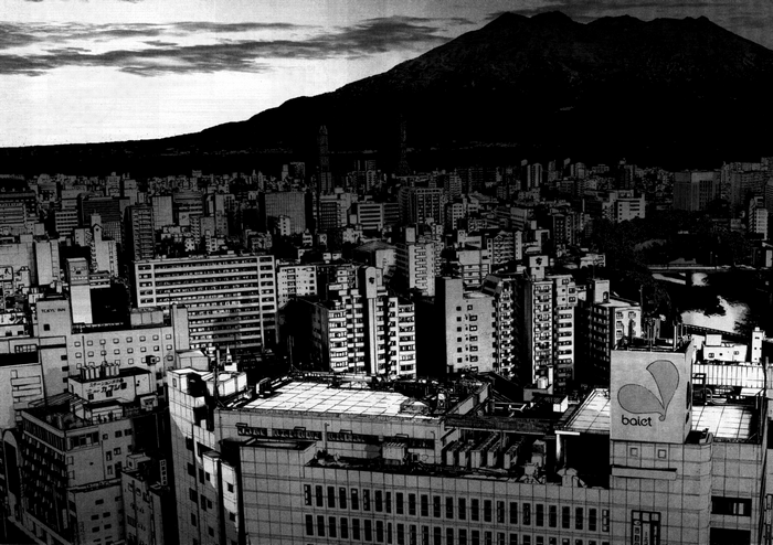 Cityscape with mountain and clouds