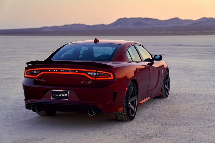 Red Dodge Charger SRT Hellcat in desert landscape