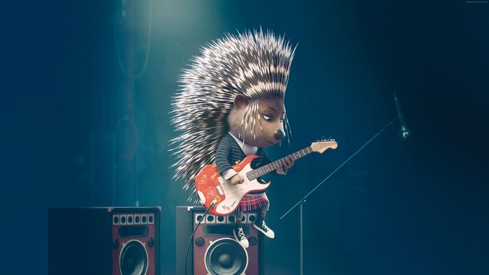 Ash the porcupine playing guitar on stage