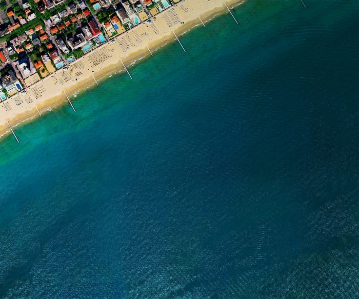 Aerial view of a beach resort town and the ocean