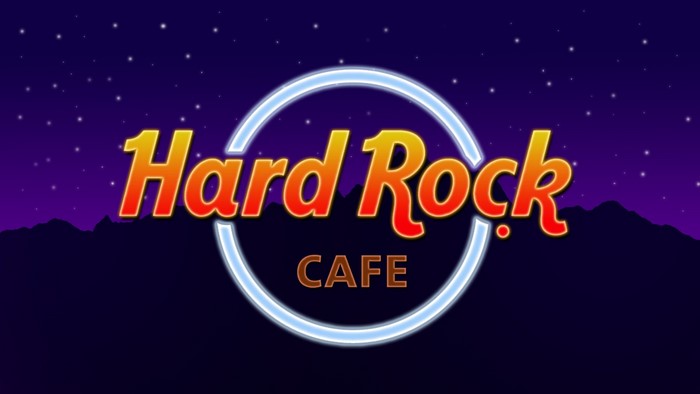 Hard Rock Cafe logo with neon circle and starry night sky