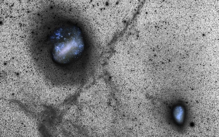 Two galaxies and dark matter tendrils in space