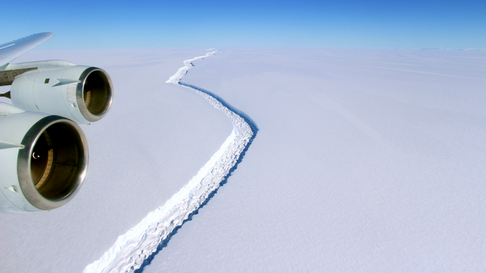 Airplane engines over a glacial crevasse