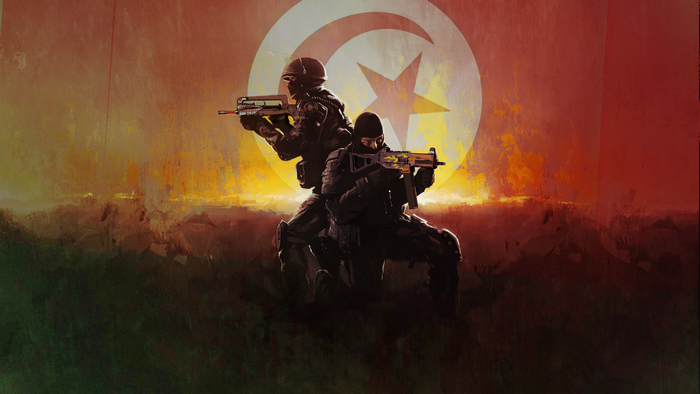 Two soldiers in front of the flag of Tunisia