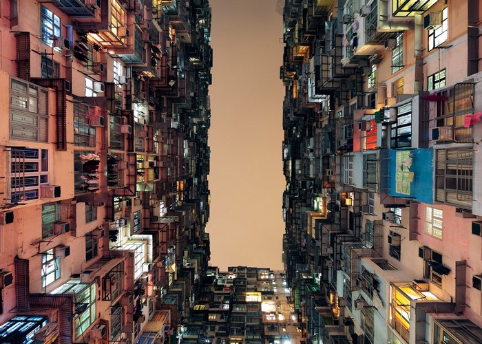 Dense apartment buildings in Hong Kong at dusk