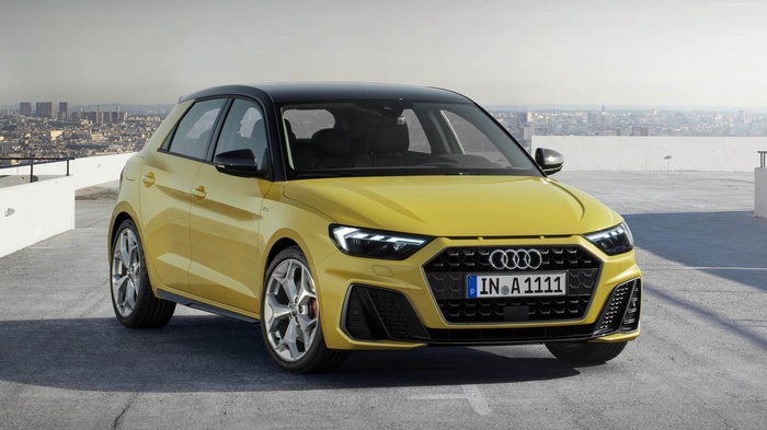Yellow Audi A1 Sportback with Black Roof