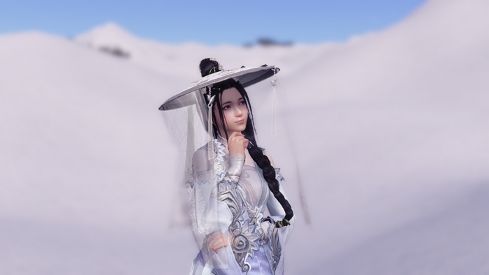 Woman in traditional Chinese attire in a snowy landscape