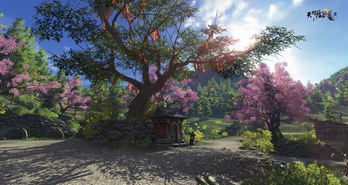 Chinese garden with blooming trees and a shrine
